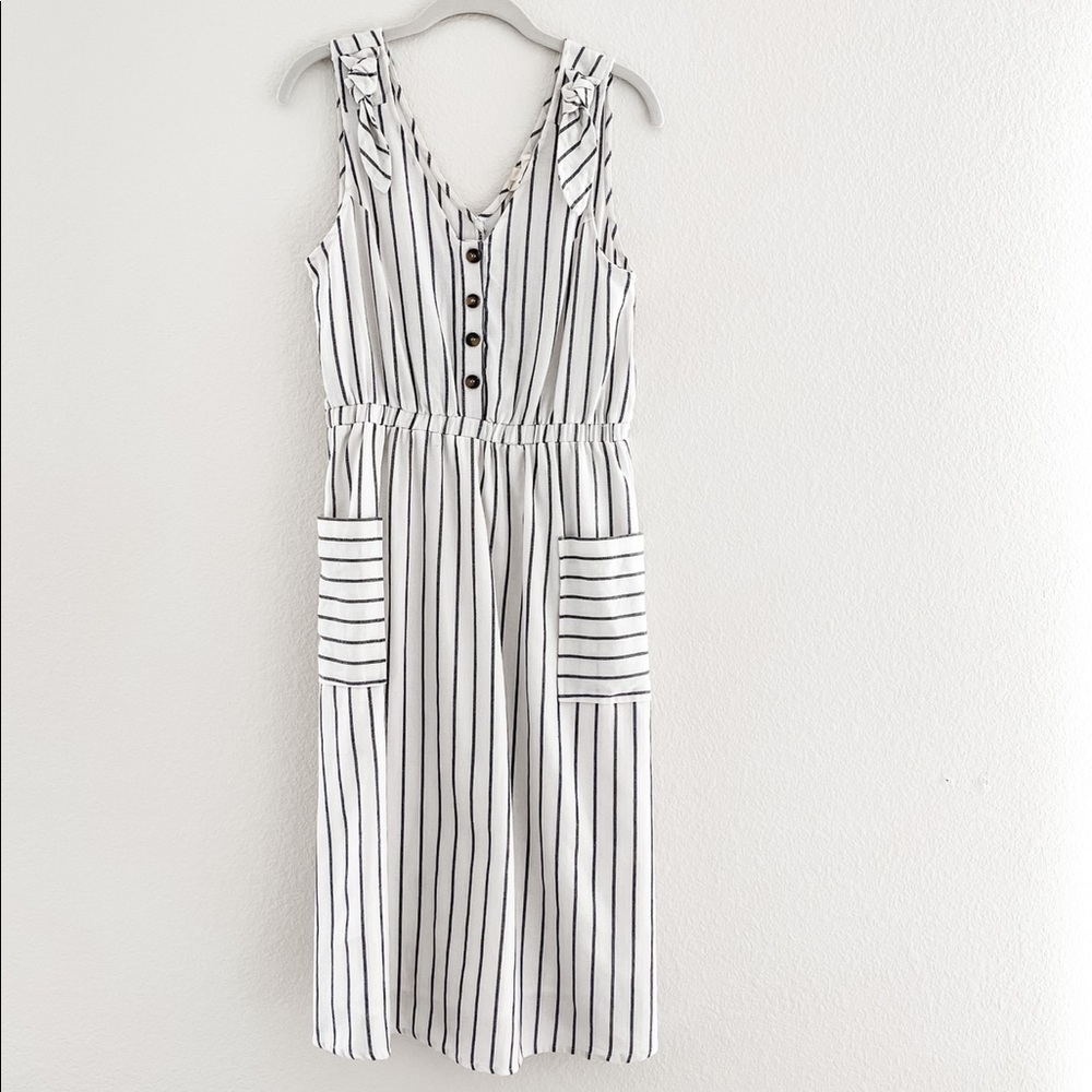 White jumper dress with gray stripes by Orange Creek.